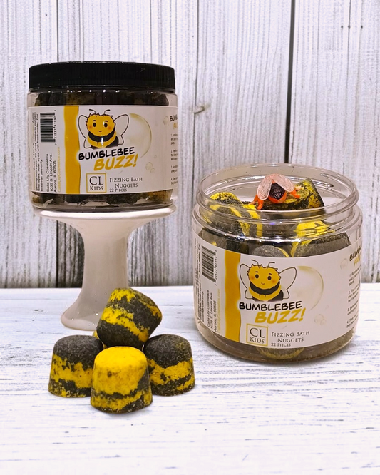 Calla Lily Cosmetics + CL kids Bumblebee Buzz bath nuggets in yellow and black, featuring honey apricot scent.