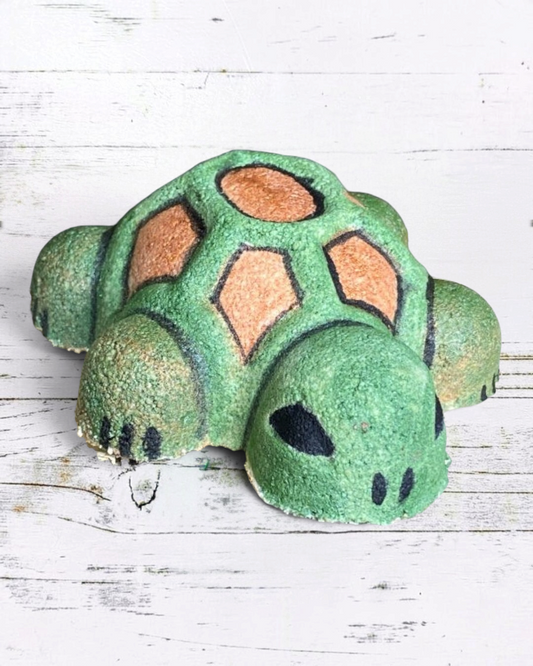 Calla Lily Cosmetics + CL kids turtle-shaped bath bomb in green and brown, crafted with cocoa butter and coconut oil.