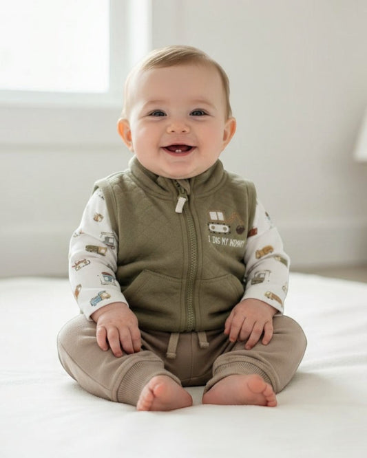 Children's outfit with green vest, patterned shirt, and brown pants on a white background