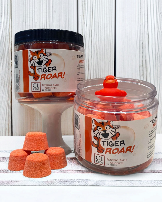 Calla Lily Cosmetics + CL kids Tiger Roar blood orange bath nuggets in clear jars with a small red duck toy