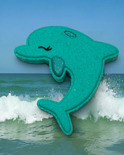 Calla Lily Cosmetics + CL kids teal dolphin-shaped bath bomb with floral scent and nourishing cocoa butter