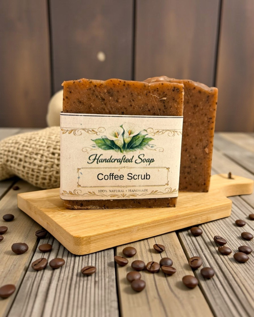 Calla Lily Cosmetics + CL kids coffee scrub bar soap with exfoliating grounds on a wooden board with coffee beans