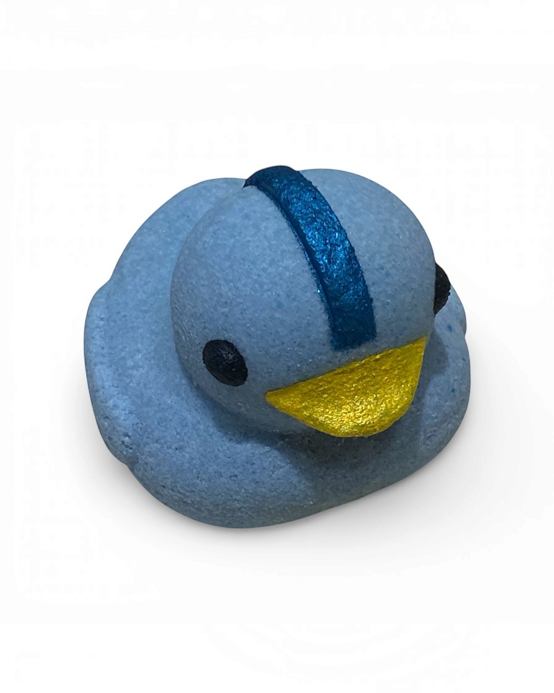 Calla Lily Cosmetics + CL kids blue duck-shaped bath bomb with a yellow beak and blueberry scent