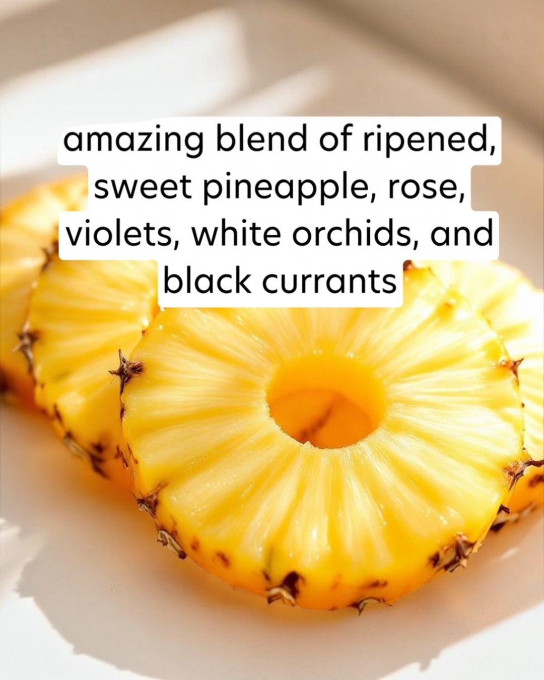Sliced pineapple on a white plate with descriptive text overlay.
