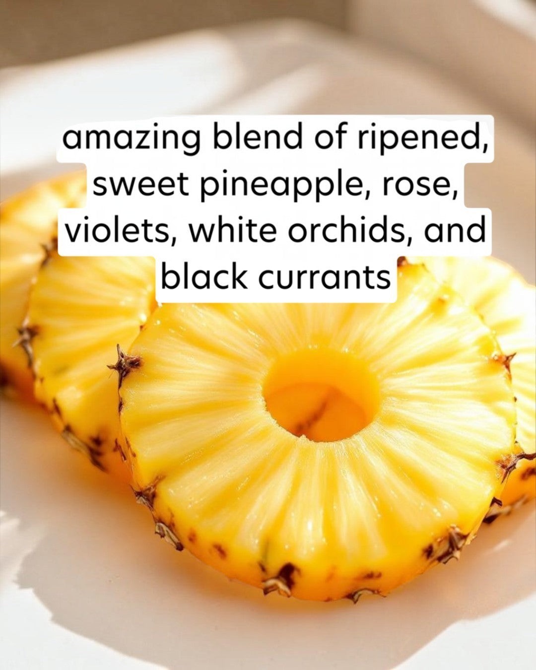 Sliced pineapple on a white plate with descriptive text overlay.