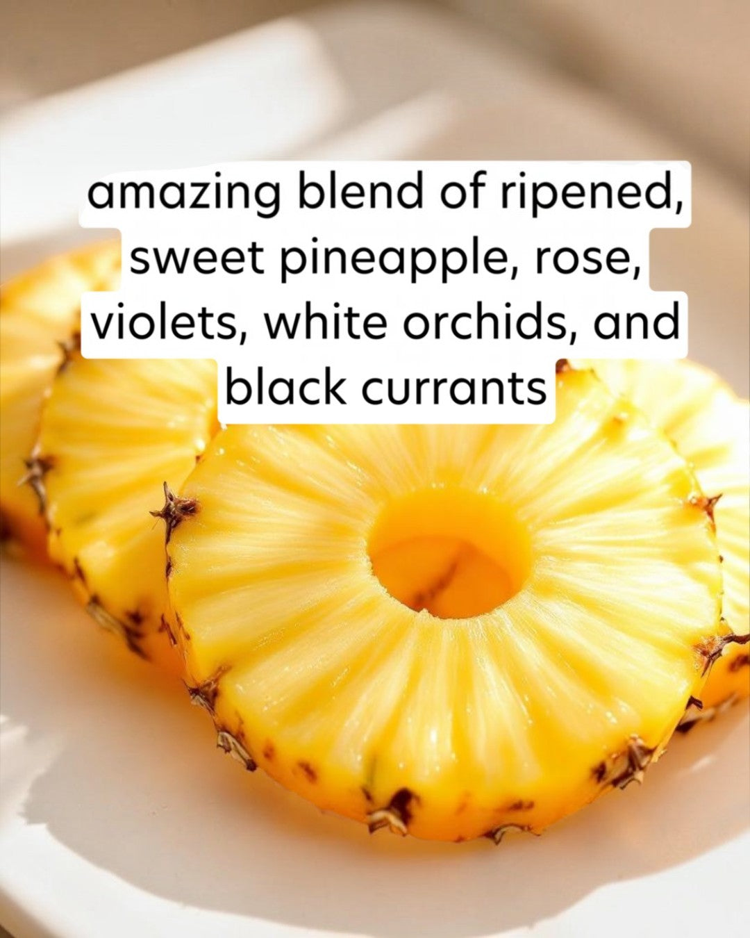 Sliced pineapple on a white plate with descriptive text overlay.