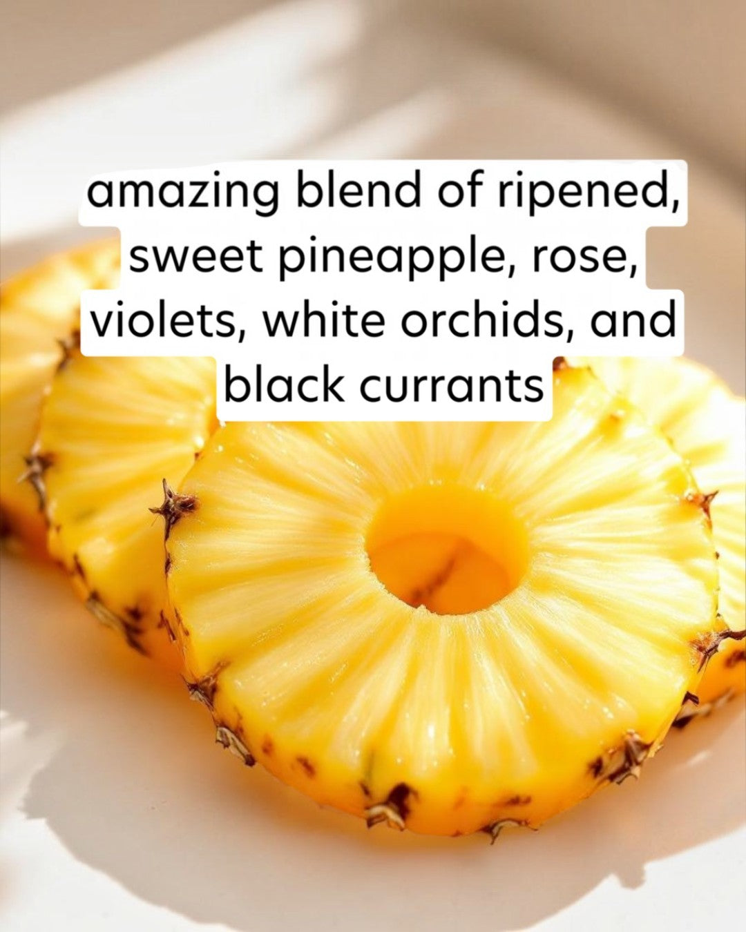 Sliced pineapple on a white plate with descriptive text overlay.
