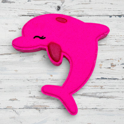 Pink dolphin-shaped toy on a white background