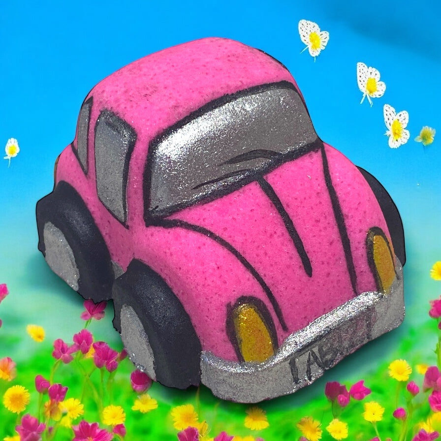 Pink bath bomb car with black tires on a colorful background with flowers and butterflies