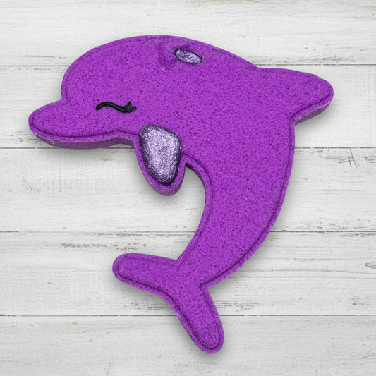 Purple dolphin-shaped toy on a white background
