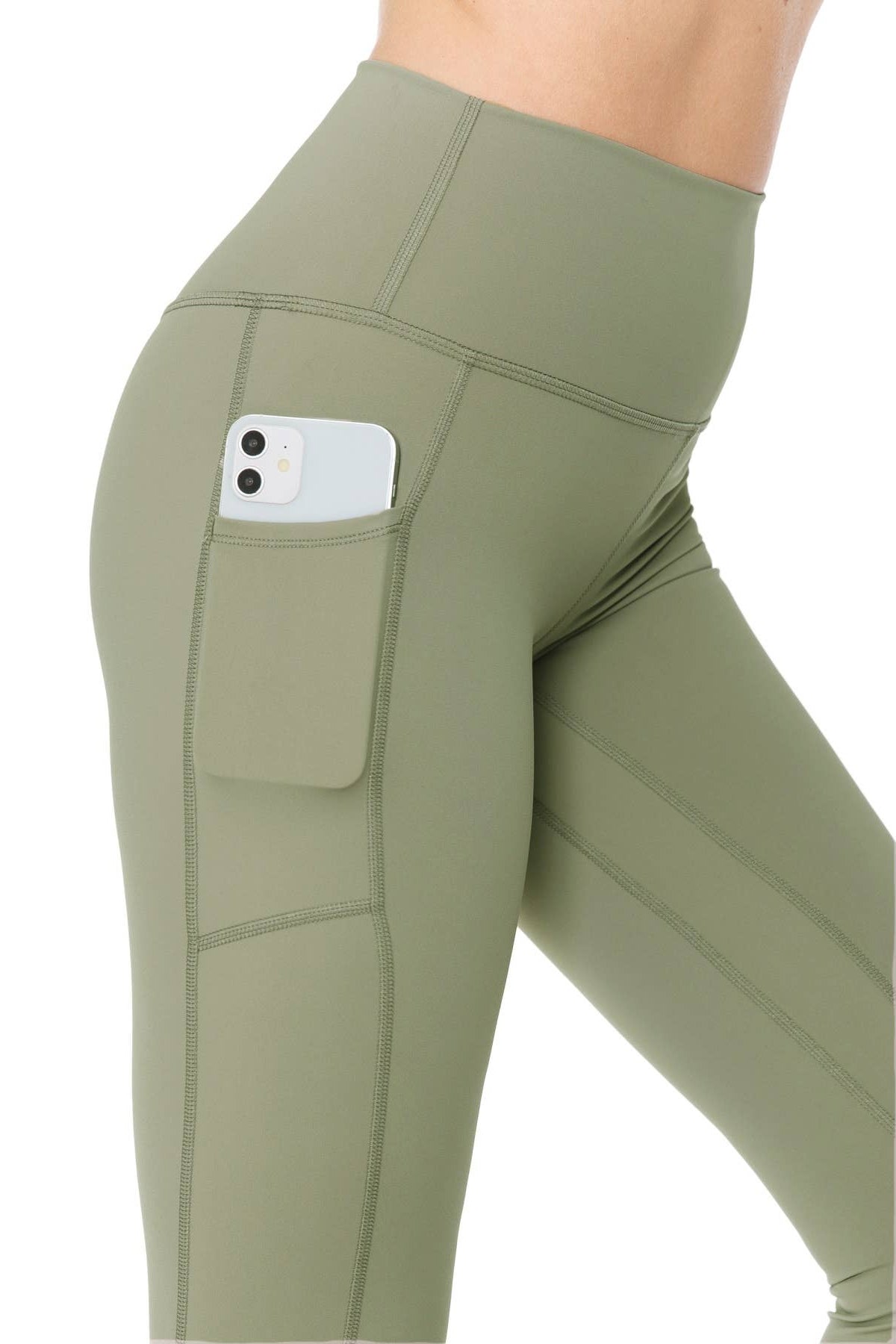 Green leggings with a pocket on a white background