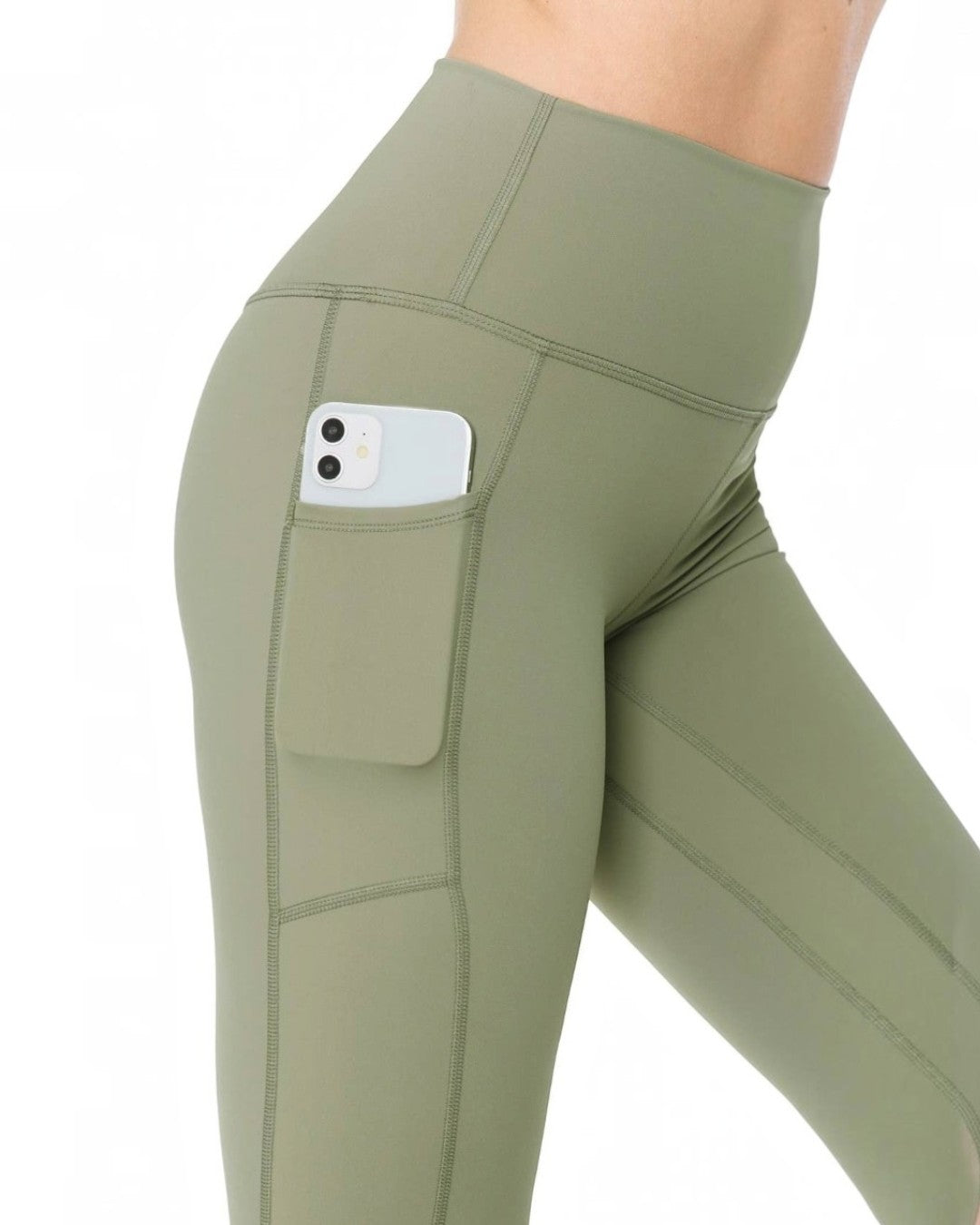 Green leggings with a pocket on a white background