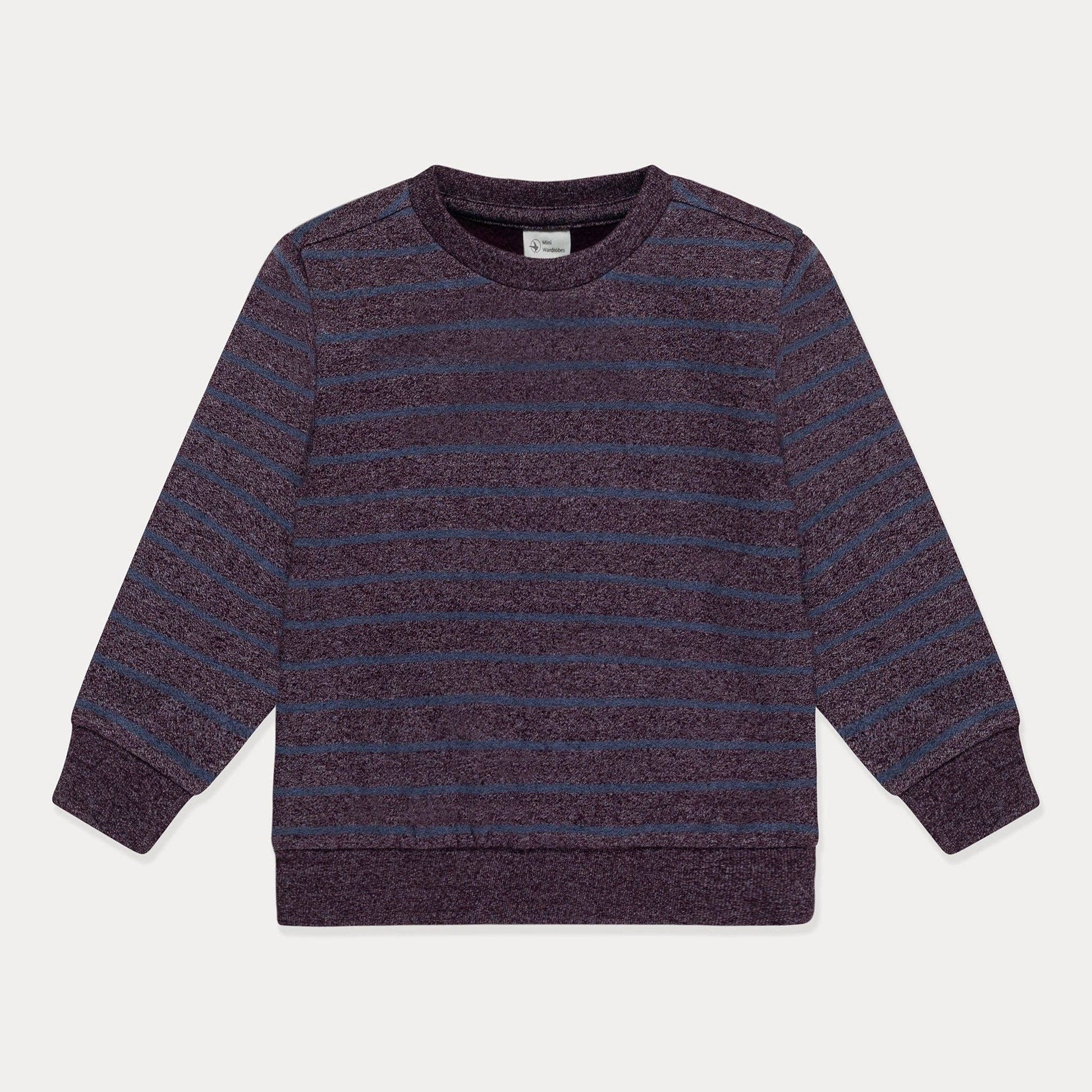 Striped sweater with purple and blue horizontal stripes on a light gray background