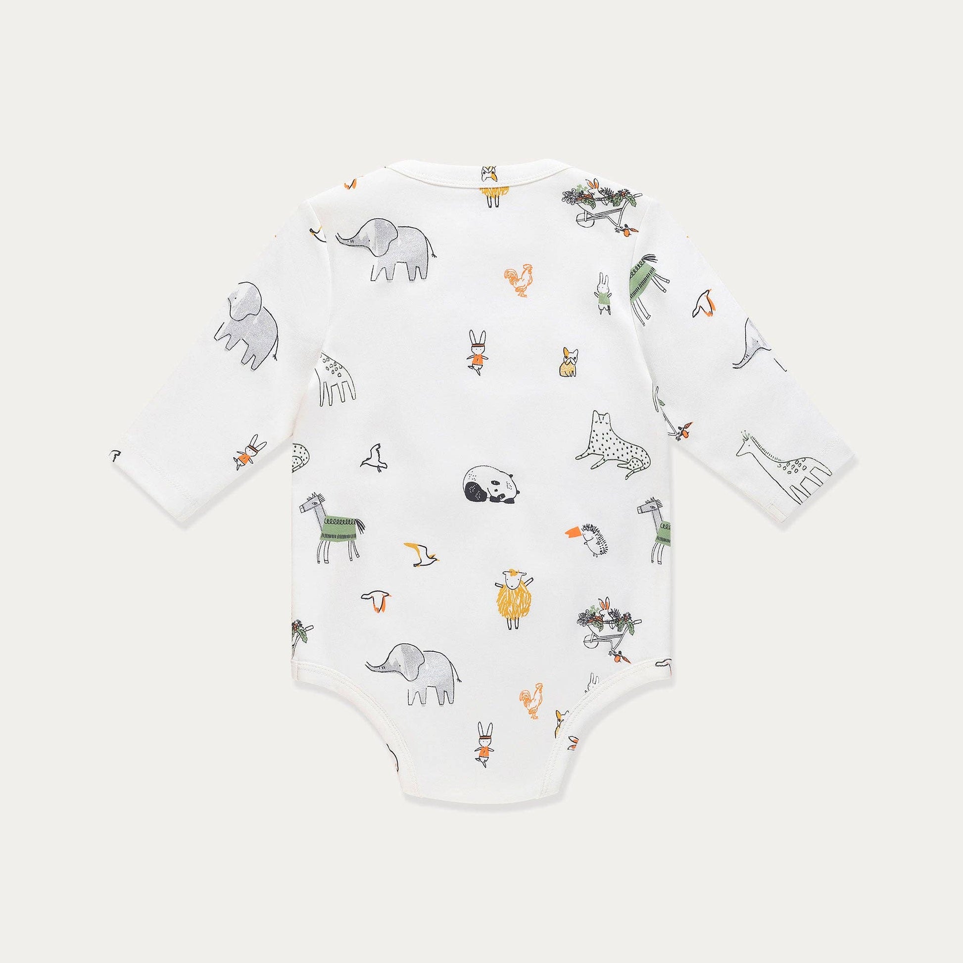 Baby onesie with animal pattern on a white background