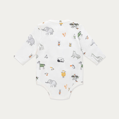 Baby onesie with animal pattern on a white background
