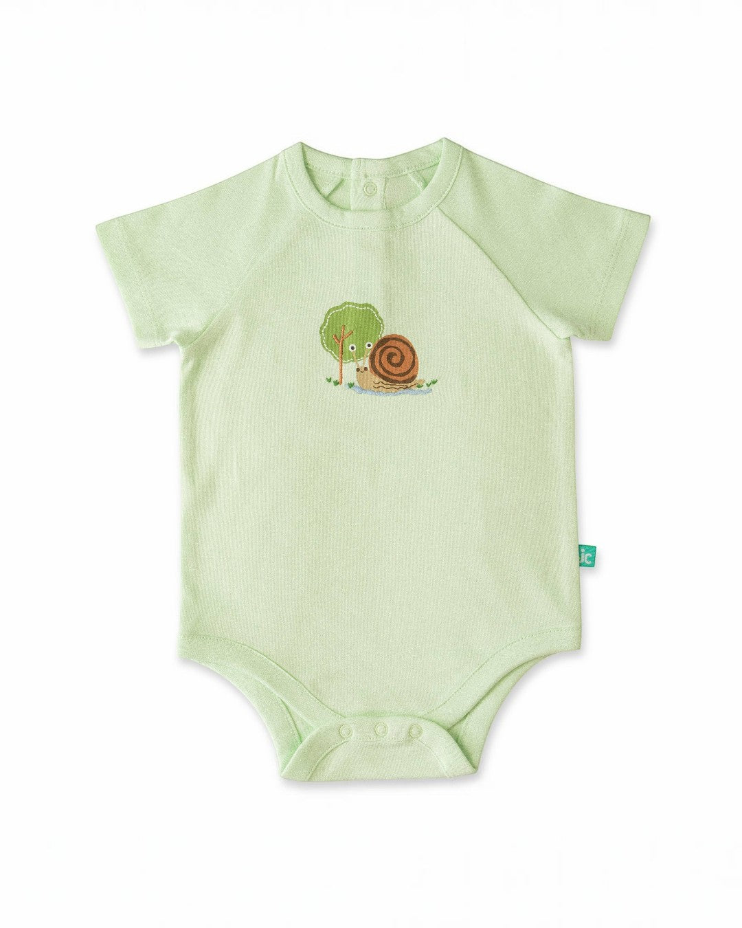 Green baby onesie with a snail design on a white background