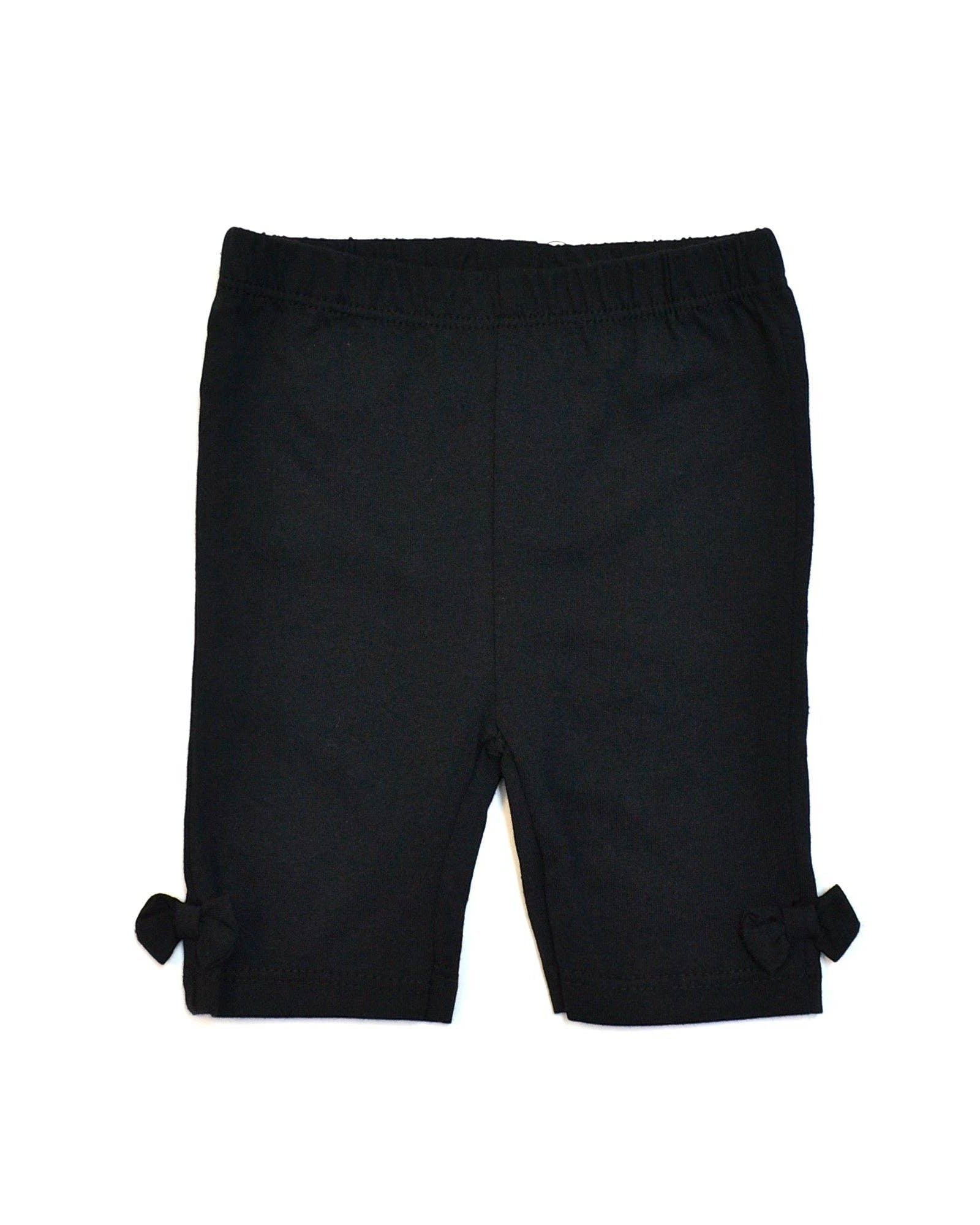 Black shorts with decorative elements on a white background