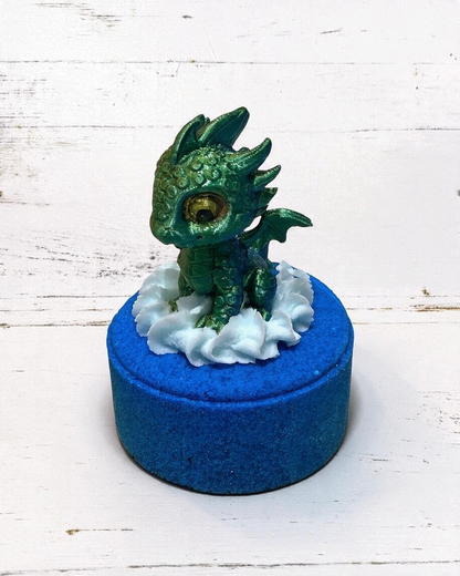 Calla Lily Cosmetics + CL kids Water Dragon bath bomb with a green 3D printed dragon toy and blue blueberry scent