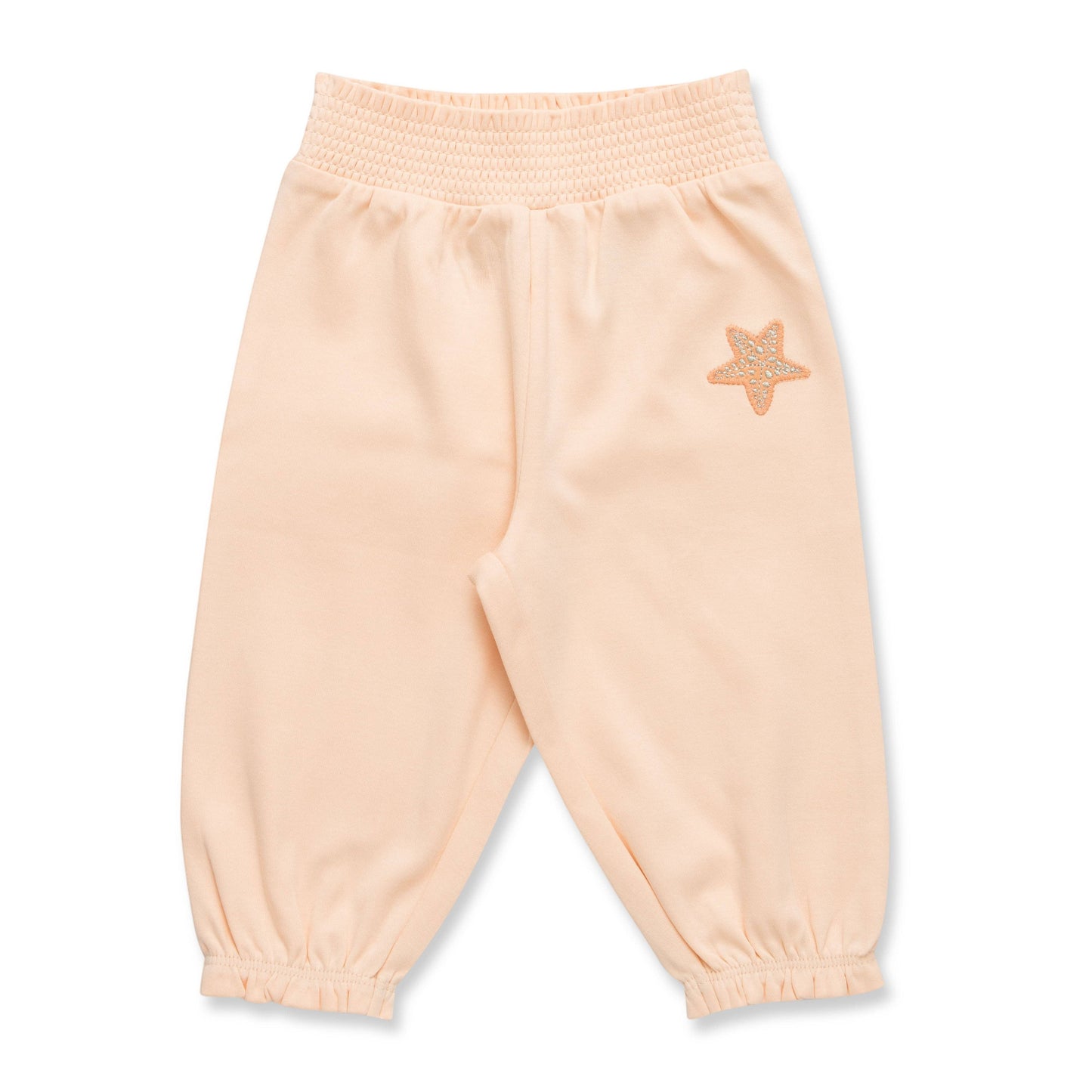 Light pink sweatpants with a star design on a white background