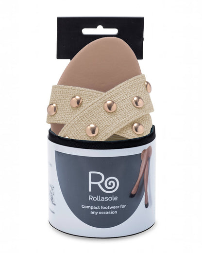Rollasole sandal with studded details in packaging on a white background