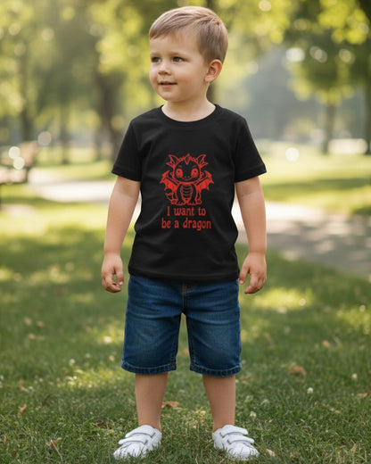 Toddler wearing a black Calla Lily Cosmetics + CL kids cotton tee with a red dragon graphic in a park setting.