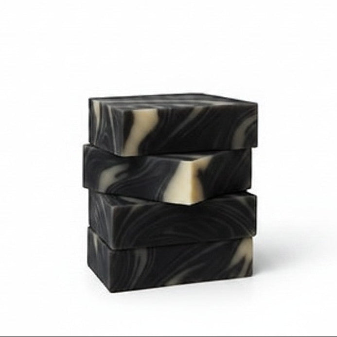 Calla Lily Cosmetics Black Forest Bar Soap with activated charcoal, swirled black and cream pattern.