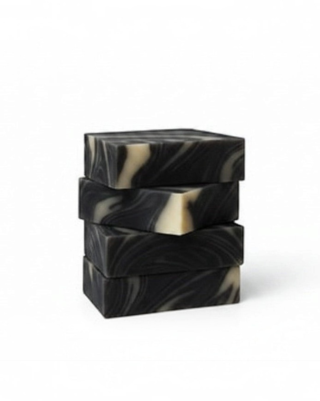 Calla Lily Cosmetics Black Forest Bar Soap with activated charcoal, swirled black and cream pattern.
