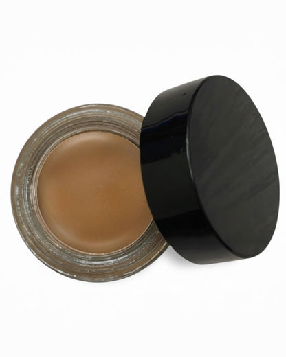Calla Lily Cosmetics Cindy Brow Tint in Soft Ash, a smudge-proof and sweat-resistant brow gel in a glass pot with a black lid.