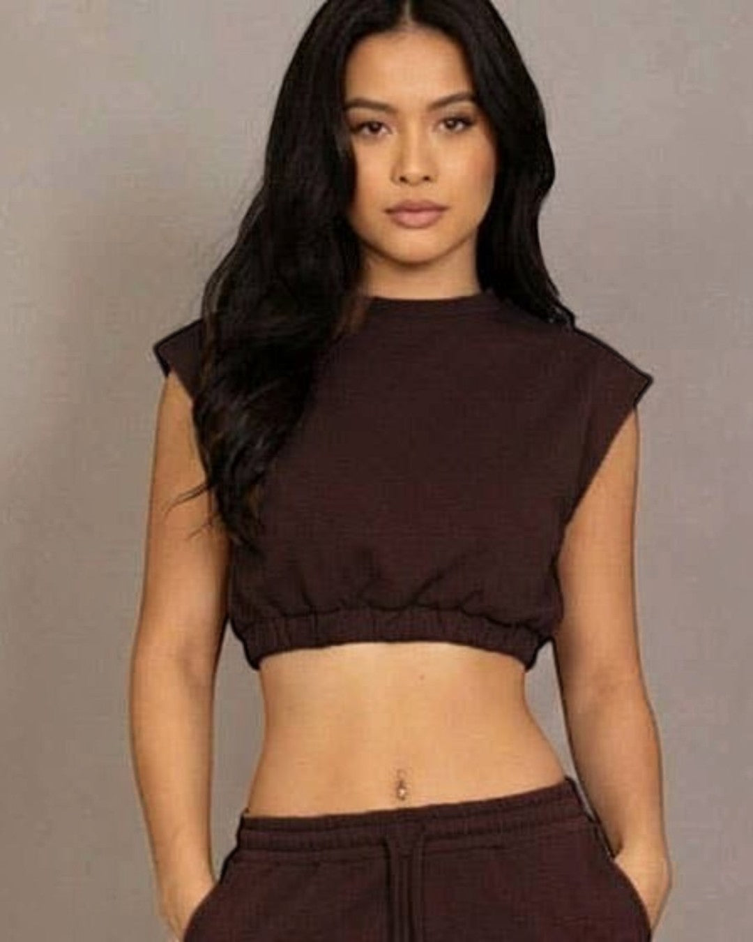 Calla Lily Cosmetics brown cotton French terry crop top with elastic hem and wide-leg pants.