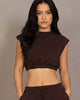 Calla Lily Cosmetics brown cotton French terry crop top with elastic hem and wide-leg pants.