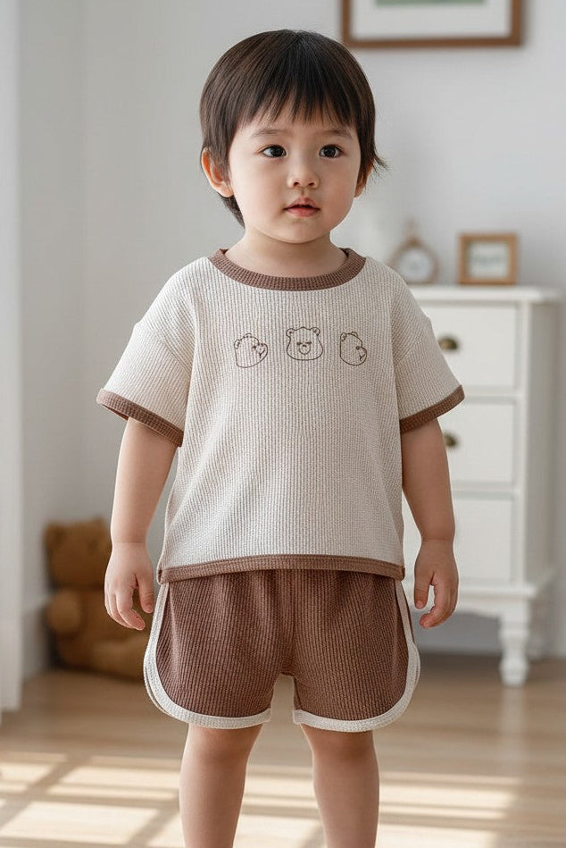 Calla Lily Cosmetics + CL kids cream waffle knit t-shirt with bear embroidery and brown shorts with cream trim.