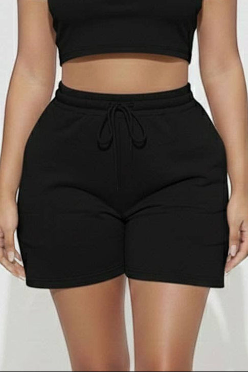 Calla Lily Cosmetics + CL kids black cotton crop tee and drawstring shorts set. Model is 5'7" wearing size S.