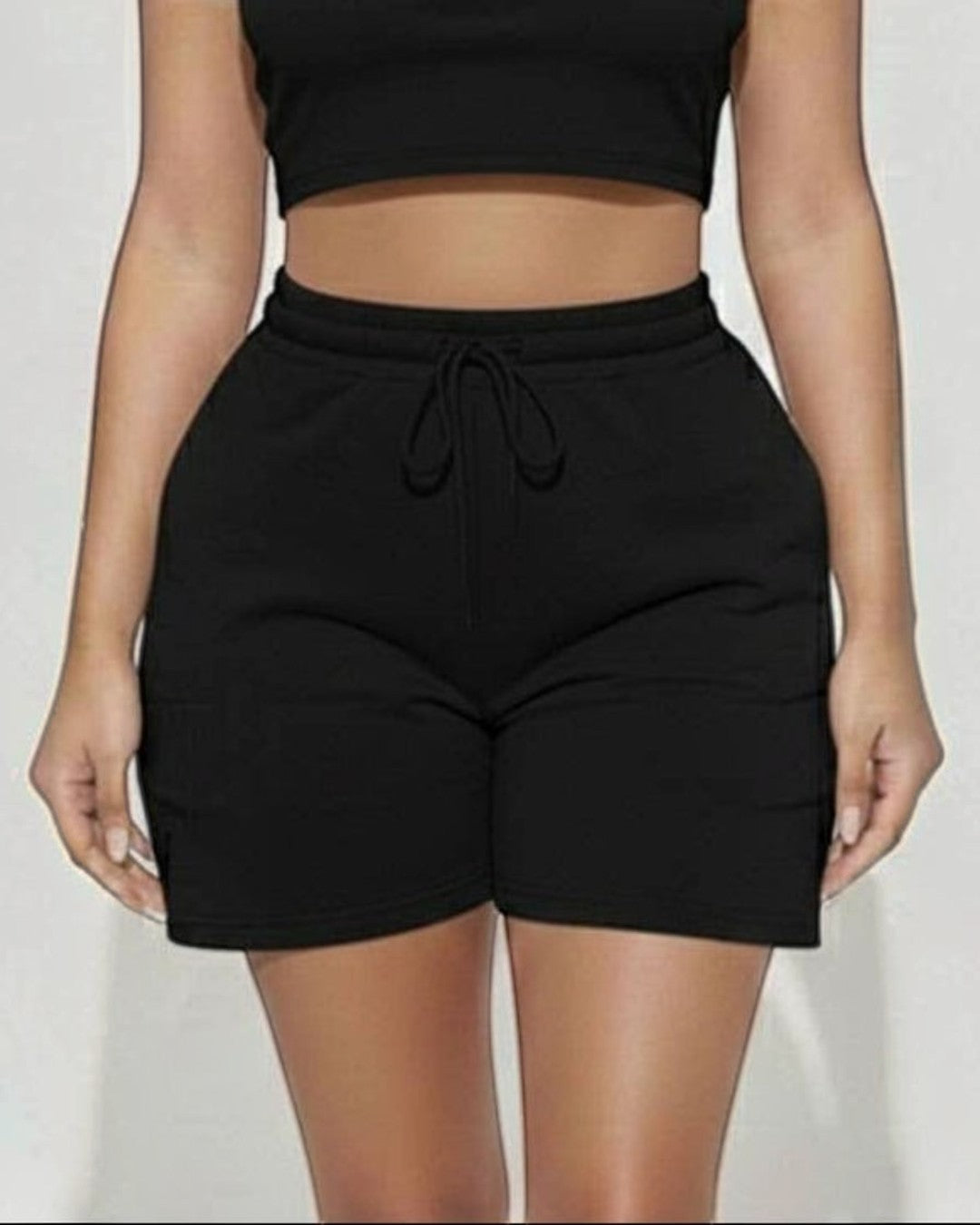 Calla Lily Cosmetics + CL kids black cotton crop tee and drawstring shorts set. Model is 5'7" wearing size S.