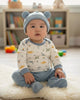 Calla Lily Cosmetics + CL kids baby boy in blue dinosaur print pajama set and matching hat