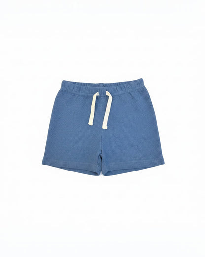 Calla Lily Cosmetics + CL kids blue waffle knit short sleeve top and elastic waist shorts set. Cotton-polyester blend.