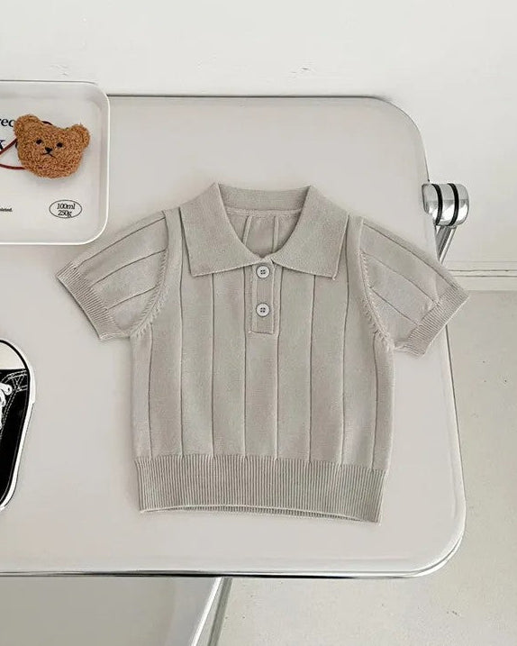 Calla Lily Cosmetics + CL kids light beige knit polo sweater for boys with short sleeves and ribbed texture.
