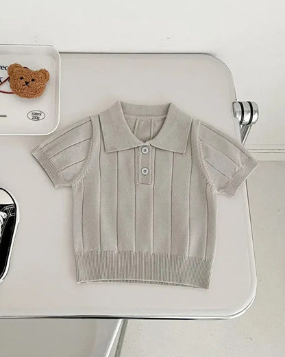 Calla Lily Cosmetics + CL kids light beige knit polo sweater for boys with short sleeves and ribbed texture.