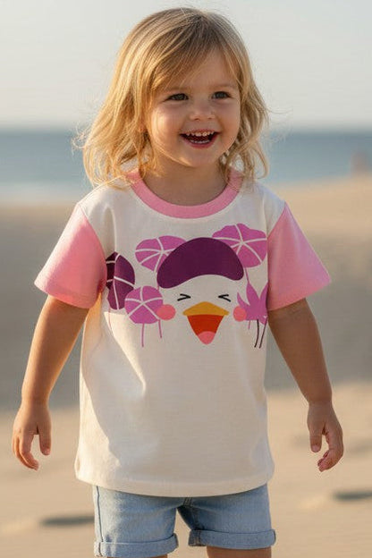 Calla Lily Cosmetics + CL kids cream t-shirt with pink sleeves and a cartoon duck graphic. Short-sleeve, crew neck.