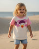 Calla Lily Cosmetics + CL kids cream t-shirt with pink sleeves and a cartoon duck graphic. Short-sleeve, crew neck.