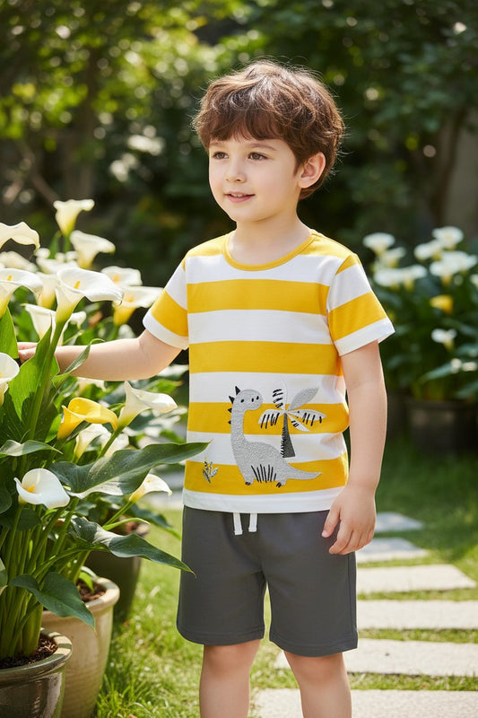 Calla Lily Cosmetics + CL kids yellow and white striped cotton t-shirt with grey dinosaur graphic and grey shorts.
