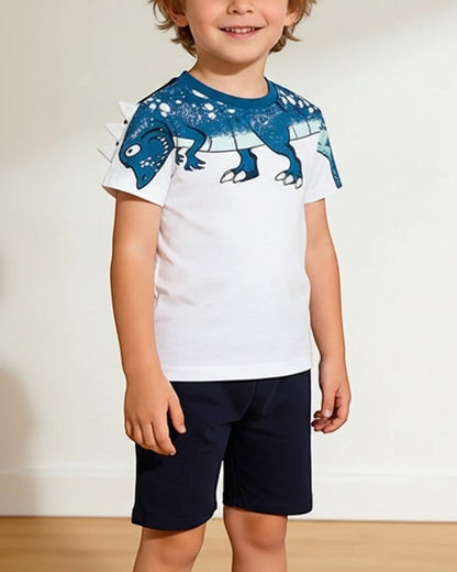 Two boys wearing Calla Lily Cosmetics + CL kids dinosaur print cotton shorts sets. White shirt with blue dino, navy shorts. Green shirt with navy top, lime shorts.
