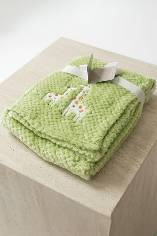 Calla Lily Cosmetics + CL kids green popcorn plush baby blanket with giraffe embroidery. Soft polyester.