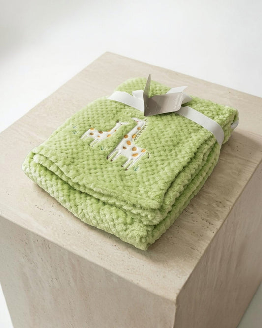 Calla Lily Cosmetics + CL kids green popcorn plush baby blanket with giraffe embroidery. Soft polyester.