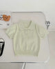 Calla Lily Cosmetics + CL kids light green knit polo sweater with short sleeves and button closure.