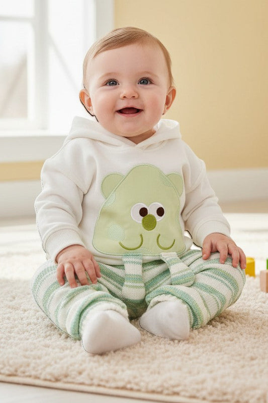 Calla Lily Cosmetics + CL kids white hoodie with green cartoon applique and striped joggers for kids.