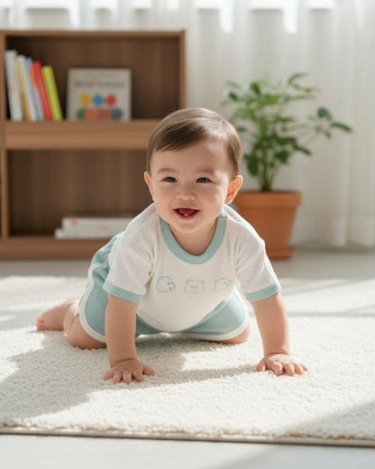 Calla Lily Cosmetics + CL kids white waffle knit t-shirt with bear embroidery and mint green shorts with white trim.