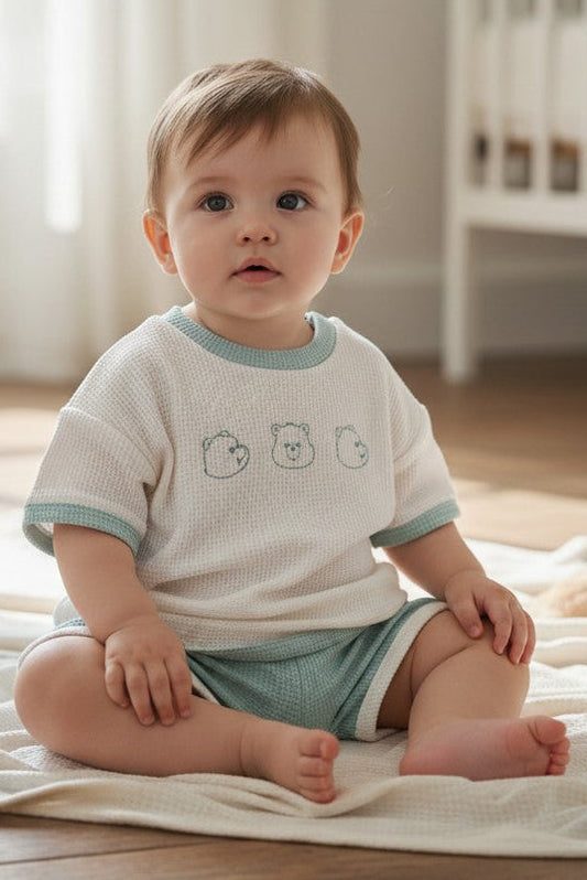 Calla Lily Cosmetics + CL kids white waffle knit t-shirt with bear embroidery and mint shorts with white trim.