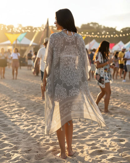 Calla Lily Cosmetics + CL kids olive viscose kimono cardigan with white mandala print and tassels at a beach festival