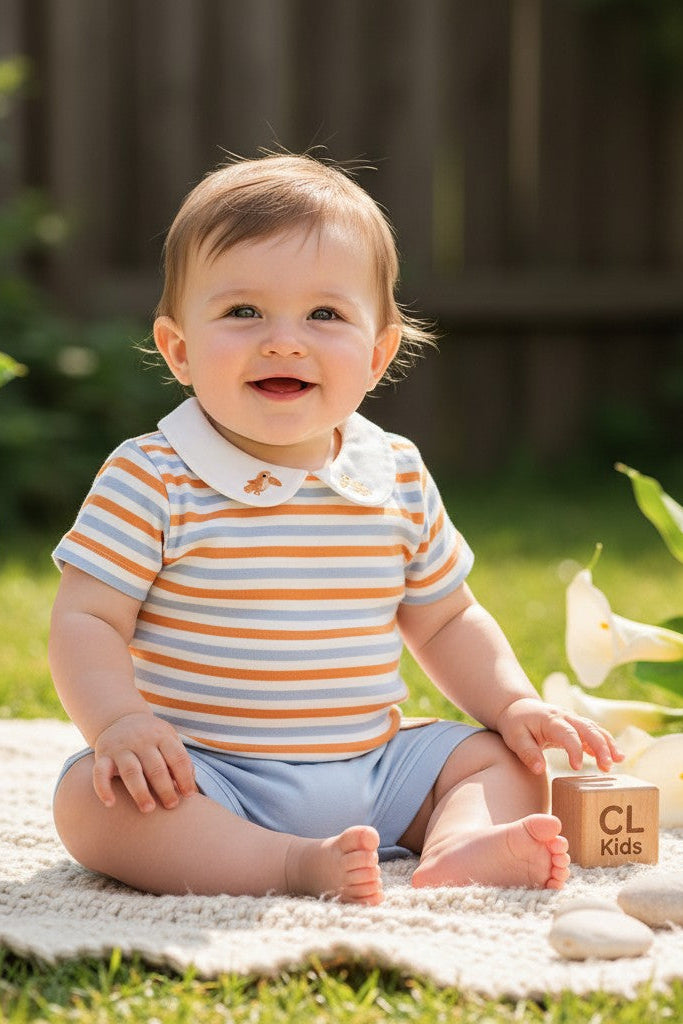 Calla Lily Cosmetics + CL kids organic cotton 3-piece baby outfit set with safari print bodysuit, striped polo bodysuit, and blue shorts.