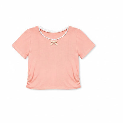 Calla Lily Cosmetics + CL kids toddler peach ribbed knit top with lace trim and bow, paired with blue chambray shorts.